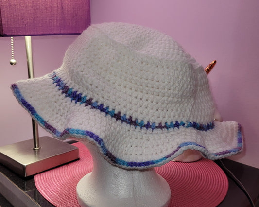 white ruffle hat