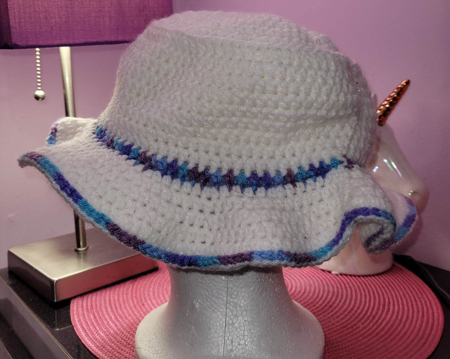 white ruffle hat
